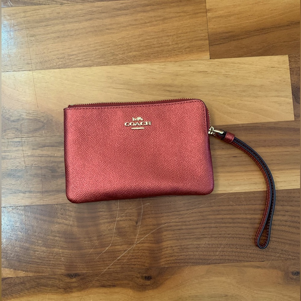 Coach Corner Zip Wristlet in orange/red